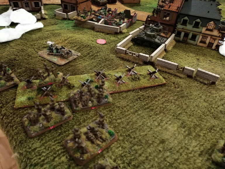 Red Platoon taking cover in the tank traps and preparing to assault the PaK40