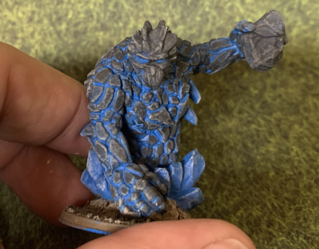 I used GW Eshin Grey as the base coat over the AP Crystal Blue primer then dry brushed with GW Dawnstone. I then dry brushed the crystals with white. 
