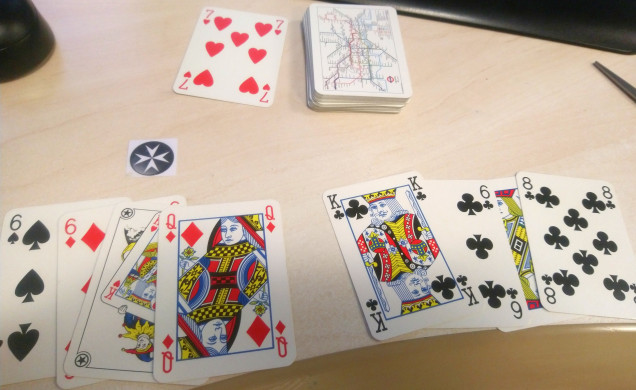 The hands of 4 cards each are dealt and the top card drawn. Player 1 has initiative. 