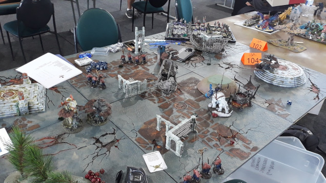 AoS Gaming table #104.... I remember there were at least 106 tables, not that I went looking for any higher numbers so there may have been more...