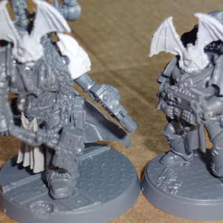 The most recent kitbashing: a Night Lord Chaos Lord and some veteran Legionnaires!