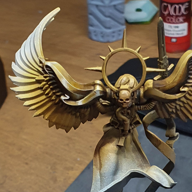 I based the model in gold brown  shaded with sepia ink then black and highlighted by adding white to the gold brown I took the first section. I think this is the only real way of doing this. Taking a part at a time then painting this. 