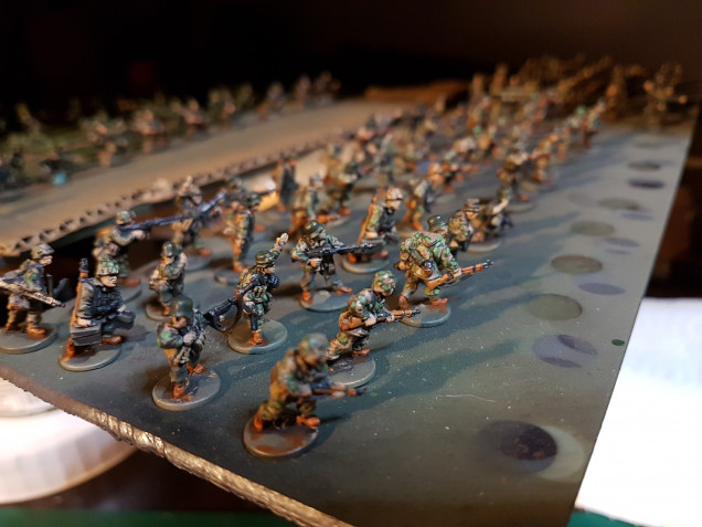  During the painting process I had all the soldiers lined up on a steel plate