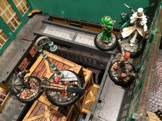 Playing any suit (thanks to her butler) Lady Q uses her heroic action to leap her monowheel to Lady Ellendeane's rescue. All three of my heroes, and the sniper outside, tried their best to take down the evil Wormwood.