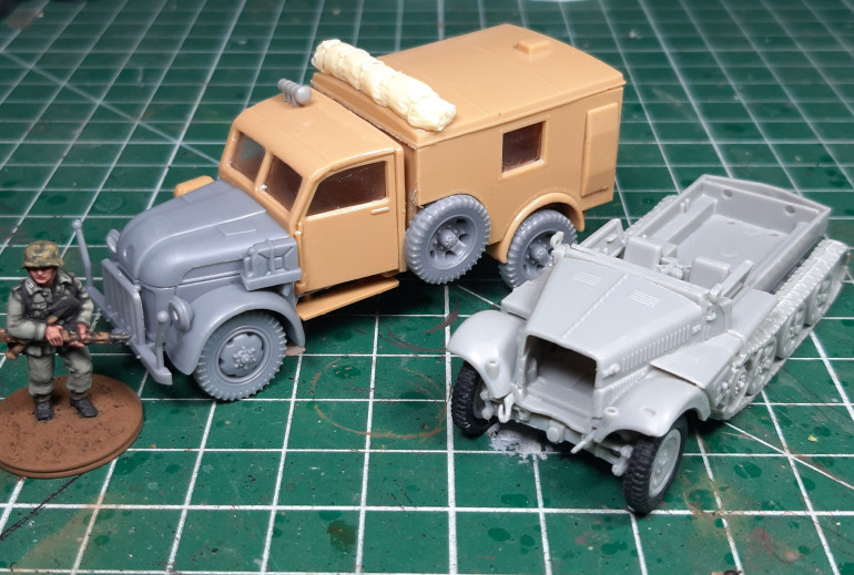 Steyr 1500 Krankenwagen and a Sdkfz 10/4 started