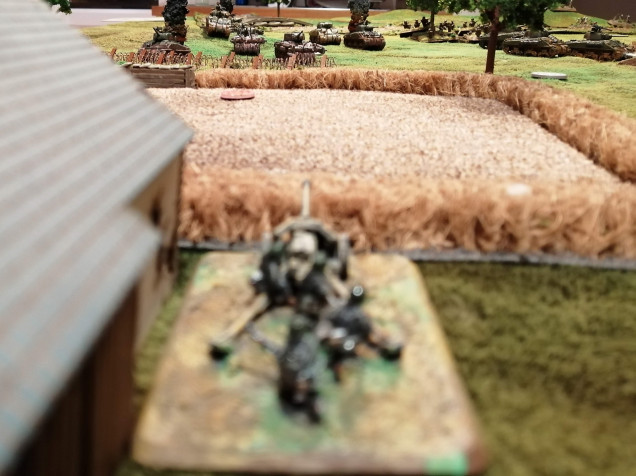 Another PaK40 breaks cover and opens up on the advancing 1st Canadian Armoured Brigade