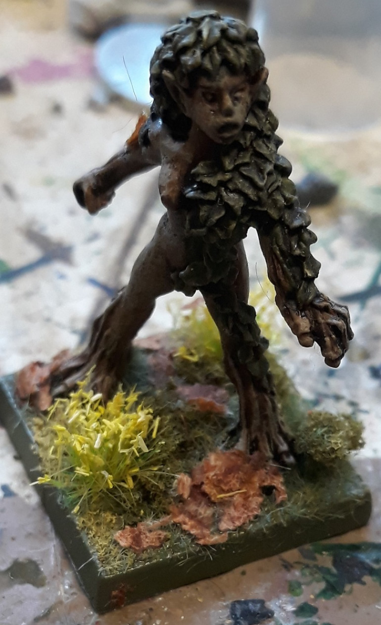 Additionally, have been working on updating my basing game (inspired by @warzan and his round base efforts). So revisited a poor old dryad mini that only ever got 2 colours of paint back in the day...