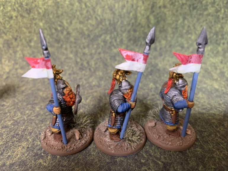 As the last step for these figures, I sprayed them with Army Painter Matt Varnish and as you can see, it discolored the paper pennants.   Lesson learned? Put the pennants on after the varnish step. 