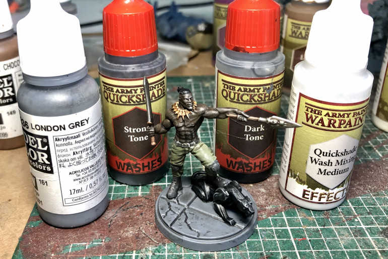 Note he was given a strong tone wash and then a dark tone over the base and skin to and some depth