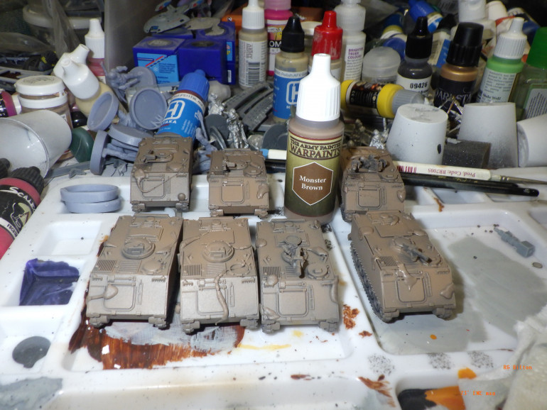 Apply a decent coat or two of Army Painter Monster Brown cut with Citadels air caste thinner