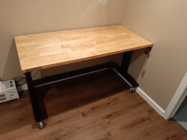 After a good search found an adjustable height heavy work bench 52