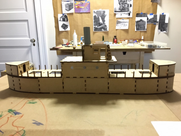 Port side aft and forward cargo hold built with mess deck and part of the bridge. I added three portholes in the mess deck to improve detail and allow for more light to enter. 