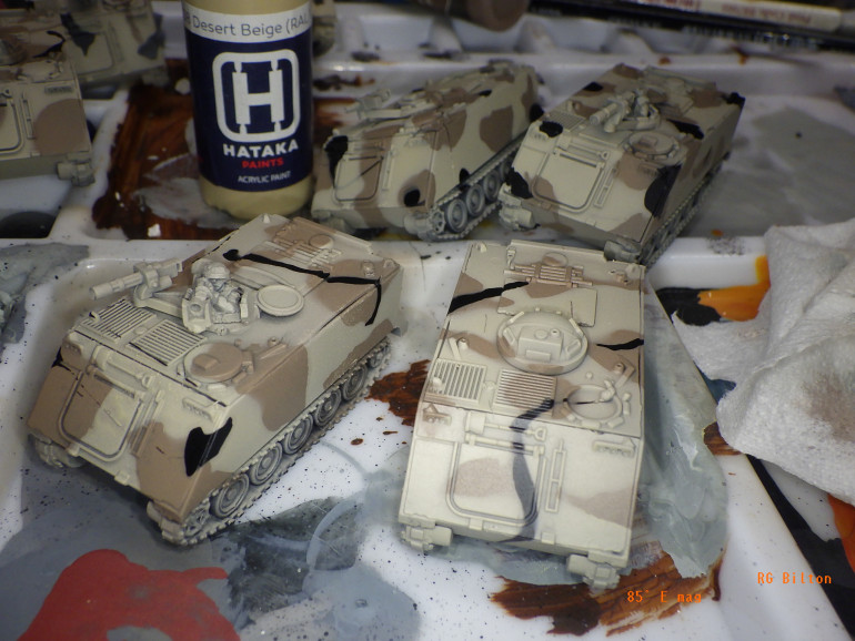 Airbrush a decent coat or two of Hataka's Desert Biege or Polish IFV Greyish Sand, to give a touch or variety