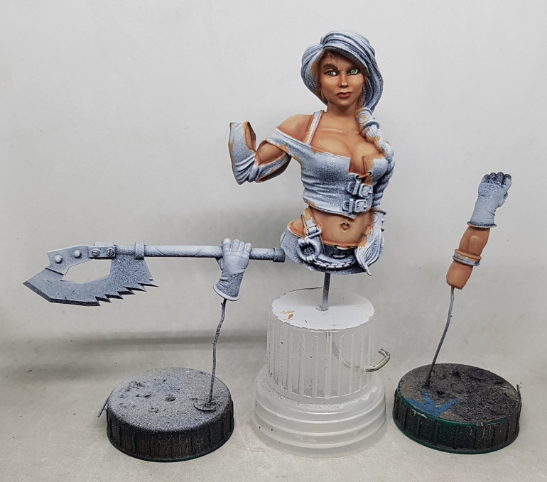 Glaze applied over the blotchy body highlights. She's looking better