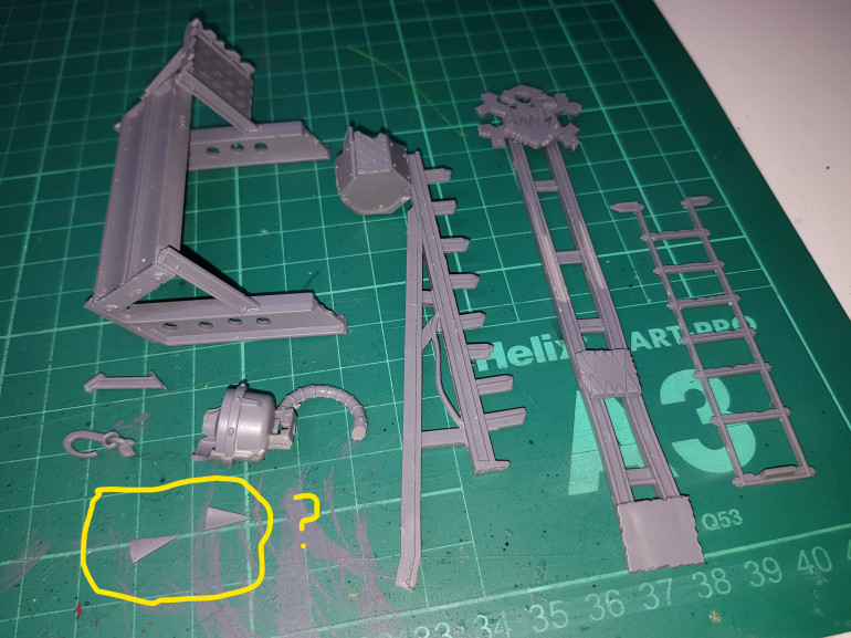 I have no idea what these random triangle bits are, not sure it'll make much difference if I leave them off but would like to know what they're intended for.