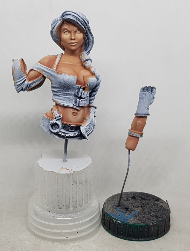 Second highlight is the first with some white added.  Once this is done a little of the first highlight and the base colour were mixed together and thinned and used to soften the edges of the highlights.