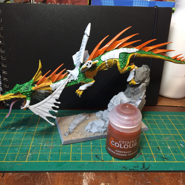 It’s a ginger! GryphHound orange for the spine. It’s at this point my plans change. It was just going to be a pretty standard yellow and green forest dragon but I really like the fiery orange...