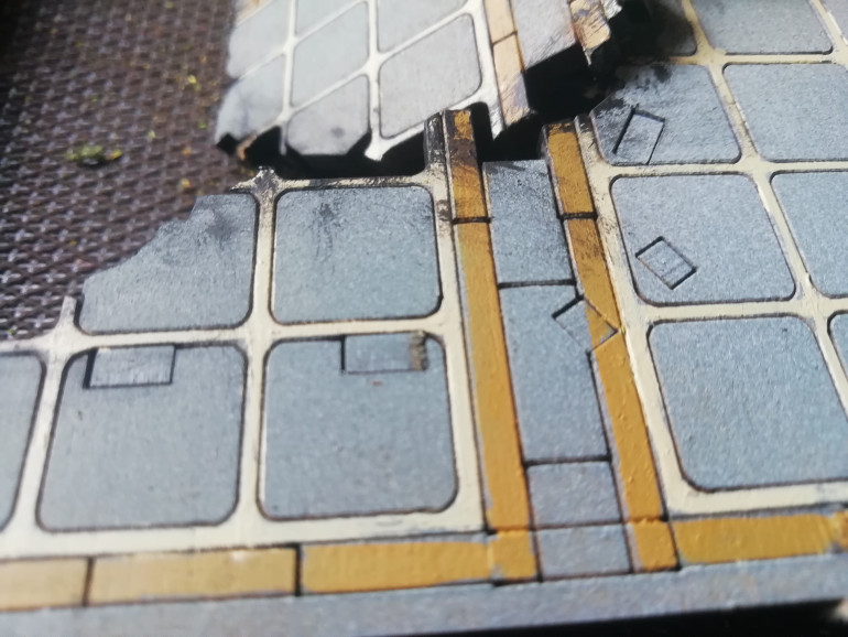 These sections have visible fixings so I disguised them with rubble