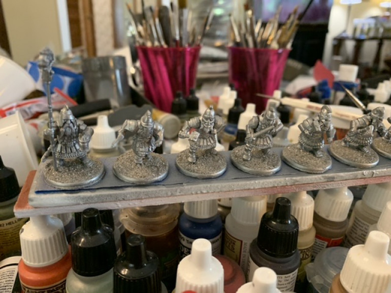 Because there’s so much armor on these figures, and virtually no cloth, I elected to use Army Painter Plate Mail Metal ad the primer. 