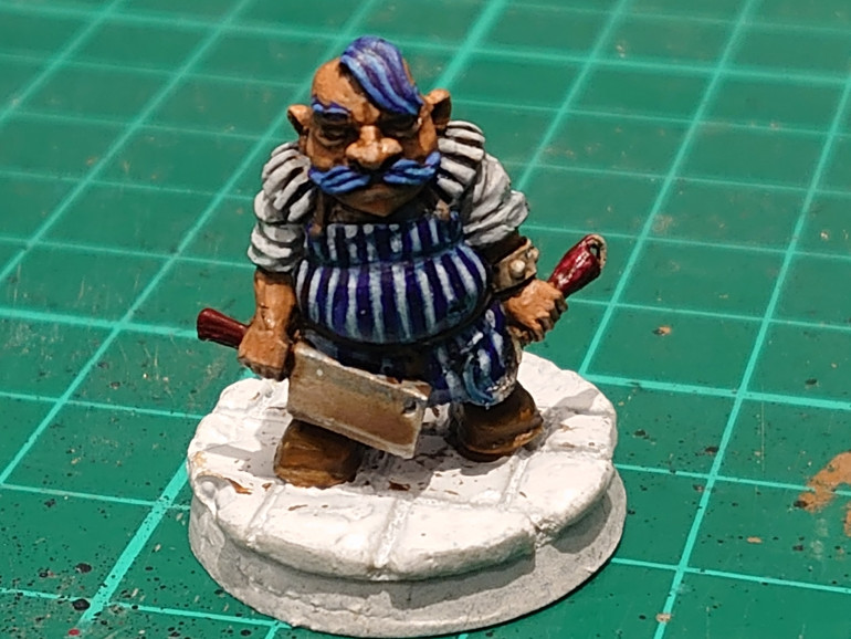 So first up on the block is Gowak the Butcher. A stout fellow, I decided to go with a blue theme. For him to match the butch striped apron. I am going to try and get as much colour into the mini's as possible.