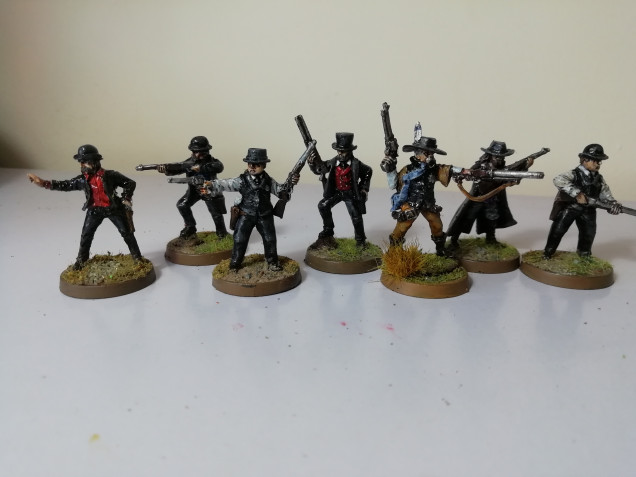 These were heavily chipped so have them a repair job. Being Pinkerton lawmen I wanted a basic black look