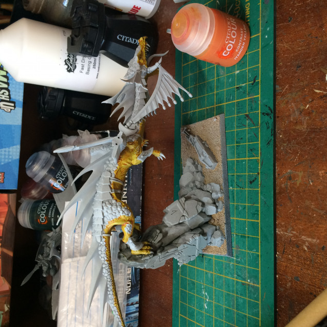 Wings now have pins in them. Sprayed grey the zenithed with Greyseer and white. Skin done with contrast Iyanden yellow. 