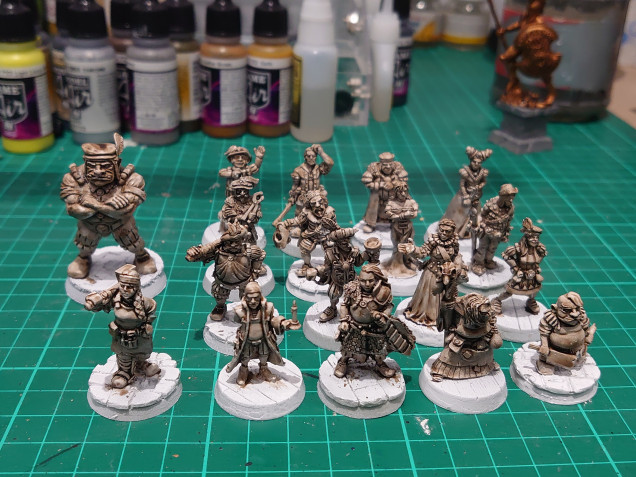 After a primer of Army Painter spray, I washed all the figures in the Army Painter strong tone. 