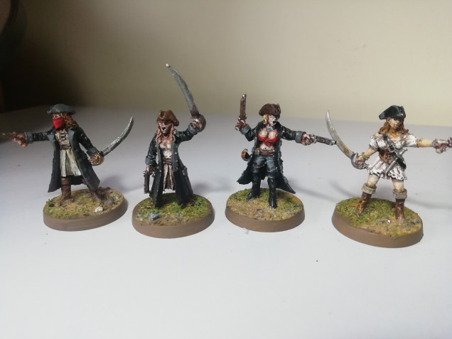 These ladies are left over from my pirate crews. They were a bit chipped but I didn't have to do to much to patch them up