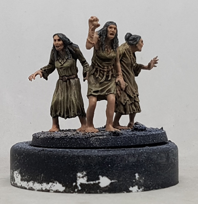 Mid tone leather: Base with Colour Party Paints MA41 Oakstaff, or any standard leather, wash with Agrax Earthshade, then highlight with P3 Beast Hide.  