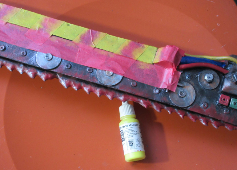 A lighter lemon paint is sponged on....