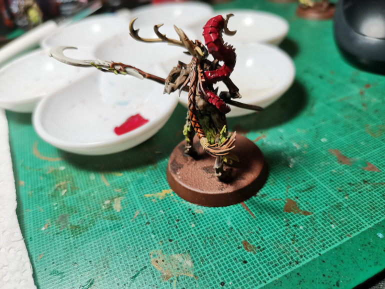 The Bug's Carapace is painted Khorne Red and dry brushed Squig Orange for subtle a highlight. Skeleton Horde for the antlers and the bone hairband thing in the hair. The hair is painted with Gore Grunta fur, this is an amazing contrast paint which I have plans to use more later in the project.