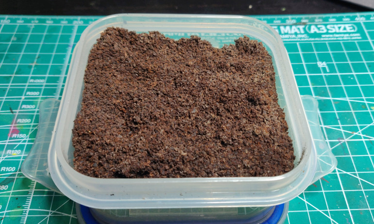 Dried out coffee grounds, make your coffee as usual, then save the grounds, spread on a baking sheet and dry thoroughly in a low temperature oven for about 45 minutes. Then spread onto kitchen towel to absorb any remaining moisture, store in a sealed tub