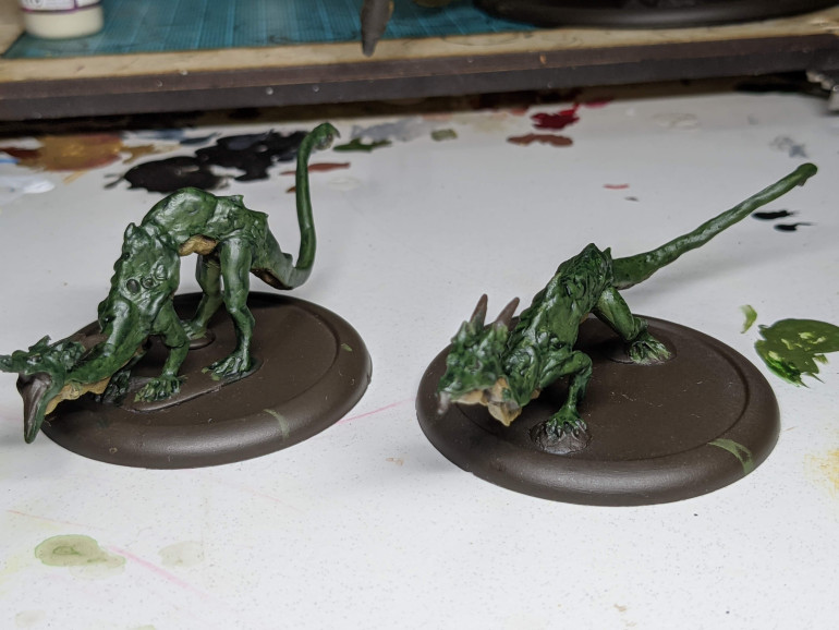 Here are the two juvenile dragons with completed bellies and the green done, bar highlighting