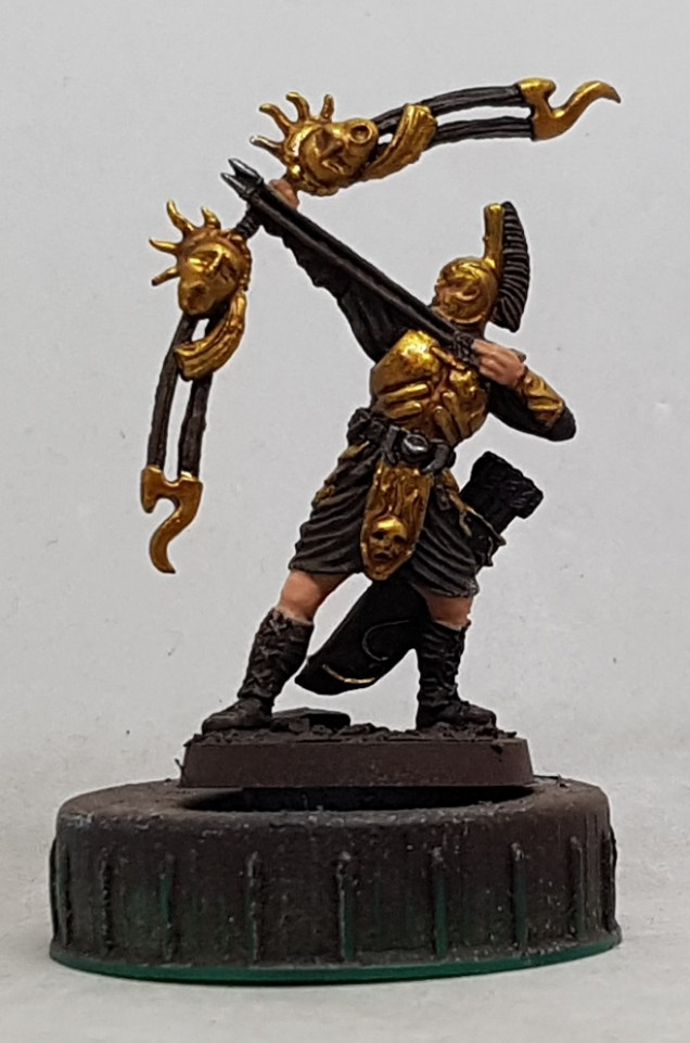 High Gold: Undercoat brown.  Base with AK Old Brass, wash with GSW Pecaton Flesh and highlight with AK Brass.  Iron: Base with P3 Pig Iron, wash with GW Nuln Oil and highlight with P3 Cold Steel.  