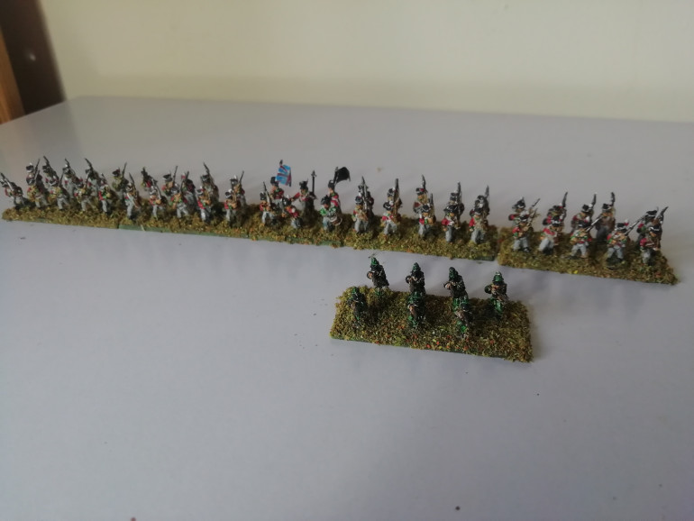 In line with my first stand of rifles