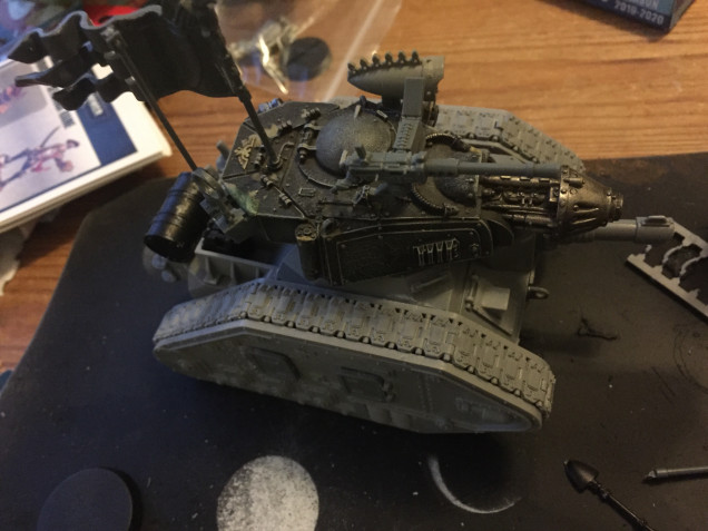 Glofski’s Leman Russ WIP. The banner comes from the OOP Bretonnian knights set with the fleur de lys top replaced with the eagle crest from a knight’s helm. This hopefully maintains the idea that the tank division belongs to the Sable ‘Knights’. The turret is from Forgeworld but needed some attention to damage on the panels.  