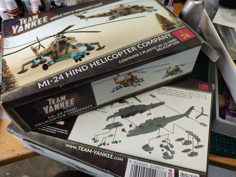 Two boxes of Mi-24 Hind Helicopters