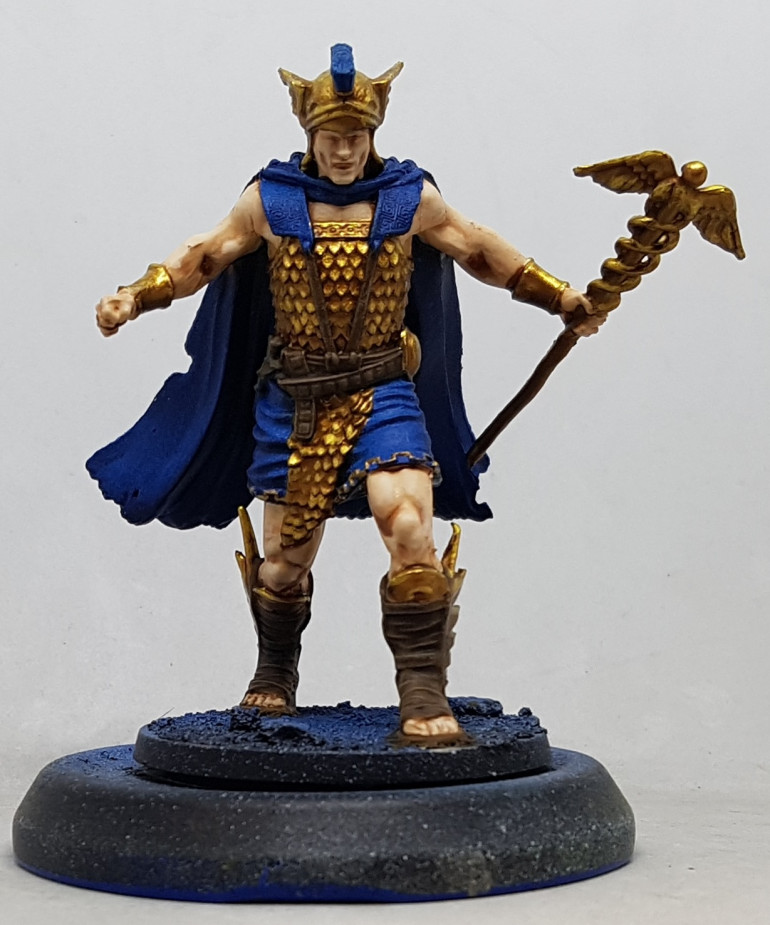 Plume: Drybrush with P3 Cygnar Blue Highlight and then P3 Trollblood Highlight. High Gold: Undercoat brown. Base with AK Old Brass, wash with GSW Pecaton Flesh and highlight with AK Brass.