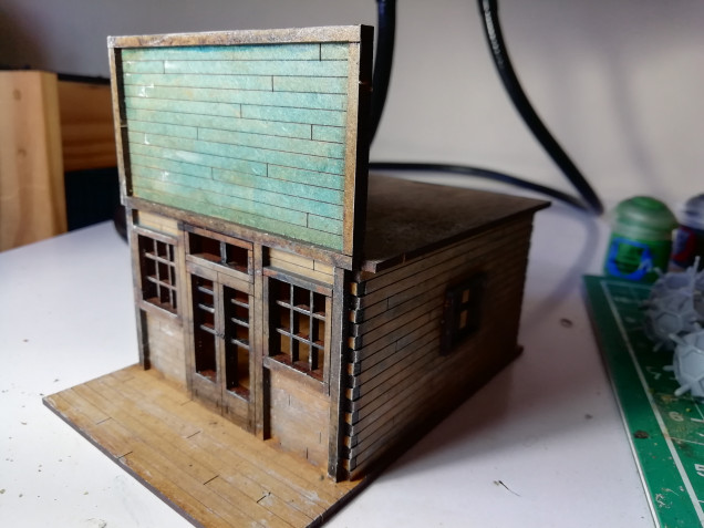 I used a contrast wash on the building before dry brushing