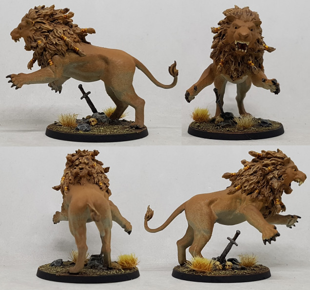 The claws, leather and gold were painted the same as elsewhere in the project and now he's done