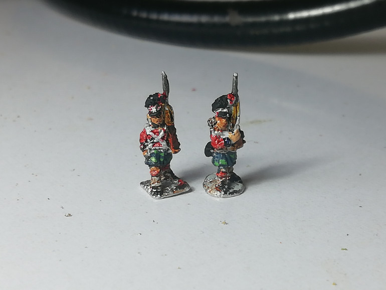 I gave the kilts a couple of dabs of lighter green to give the impression of tartan pattern