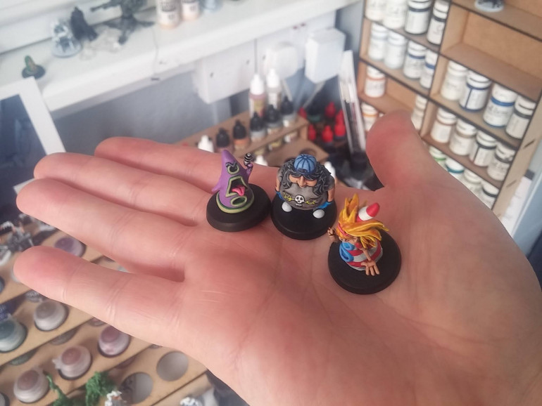 I said I'd take a photo of them on my hand to show how small the miniatures are - and my wife laughed at how my tiny Trump-hands make them look like 54mm action figures!