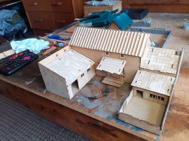 The roof is from a piece of corrugated cardboard with one smooth side removed, I am not fussed about the card chaff still on the roof as I am going to be coating roof in a pva/water mix and this will then just add interesting texture to the roof. I am next going to add barge boards to ends of roof, this will hide a new sins as well as strengthening edges