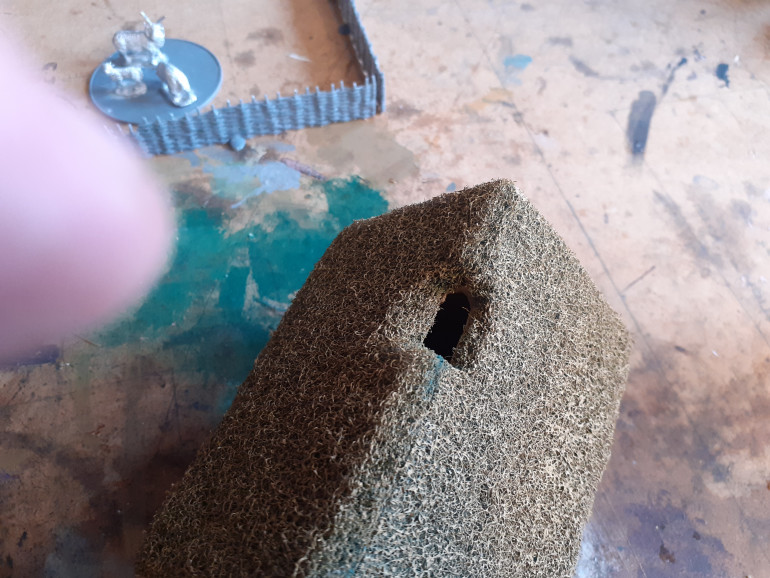 Once I had attached the brillo pads, carved out some of the excess wood on the chimney hole to improve the look.