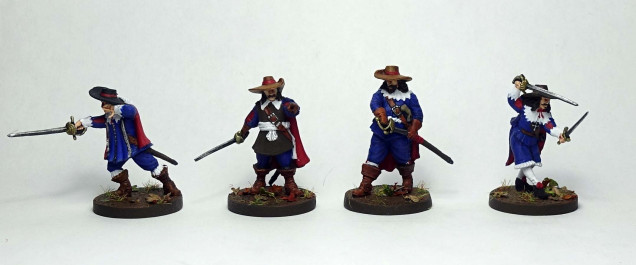 Left to right: D’Artagnan, Athos, Portos, Aramis.