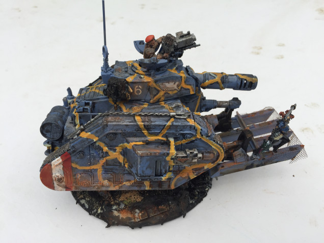 Sergeant “Big Joe” Savalas and his Leman Russ Battle Tank with Imperial Assassin Soolin Bloxx and customised dozer blade.