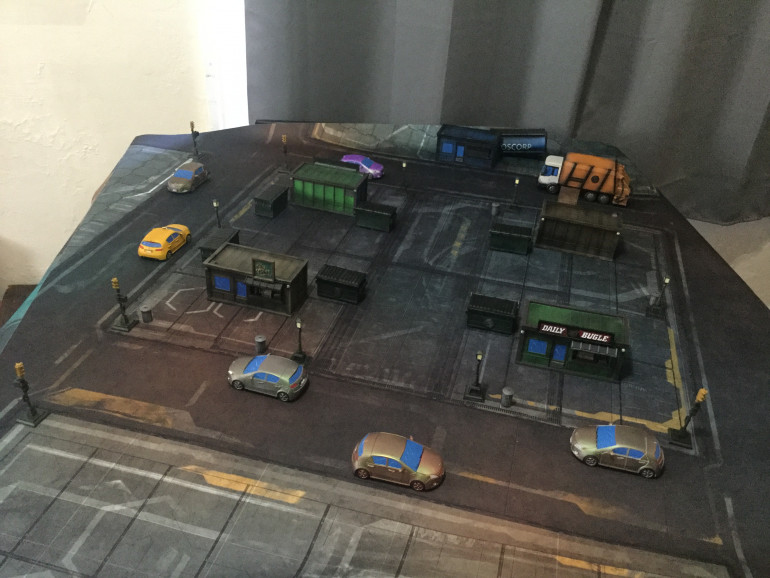 Here’s everything on the table. Granted, this is roughly 4’x4’ and the regular play area is only 3’x3’. The mat is from Deep Cut Studio and it was one of the few scaled about right for the cars. If anyone wants to know which particular one it is, let me know and I’ll look it up. 