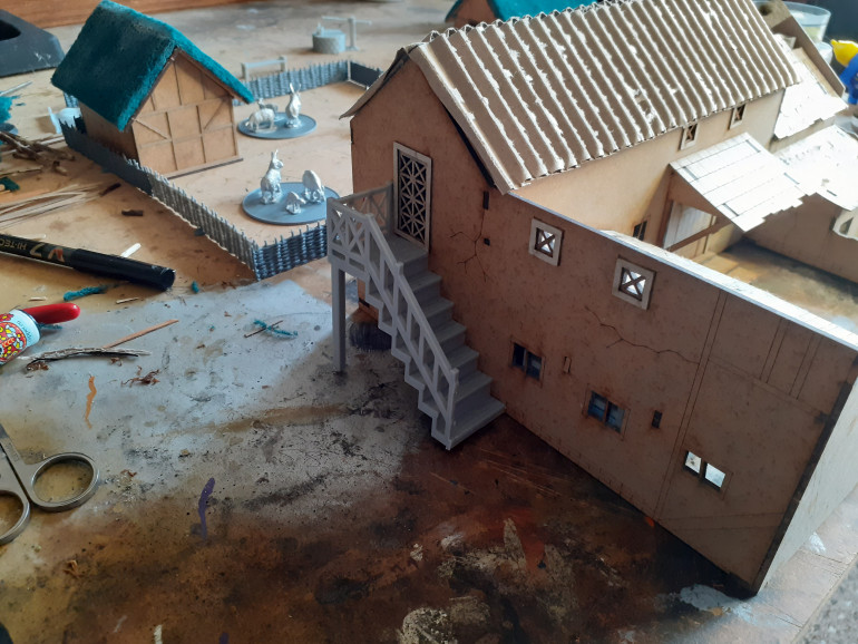 I added a stairway to the side as we had a door size aperture available and I had plans. The model is from Irongate Scenery