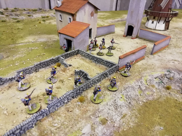 Taking off the buildings the landscape with the stone wall works well for my Napoleonic skirmish games. The vegetation works as the Iberian peninsula