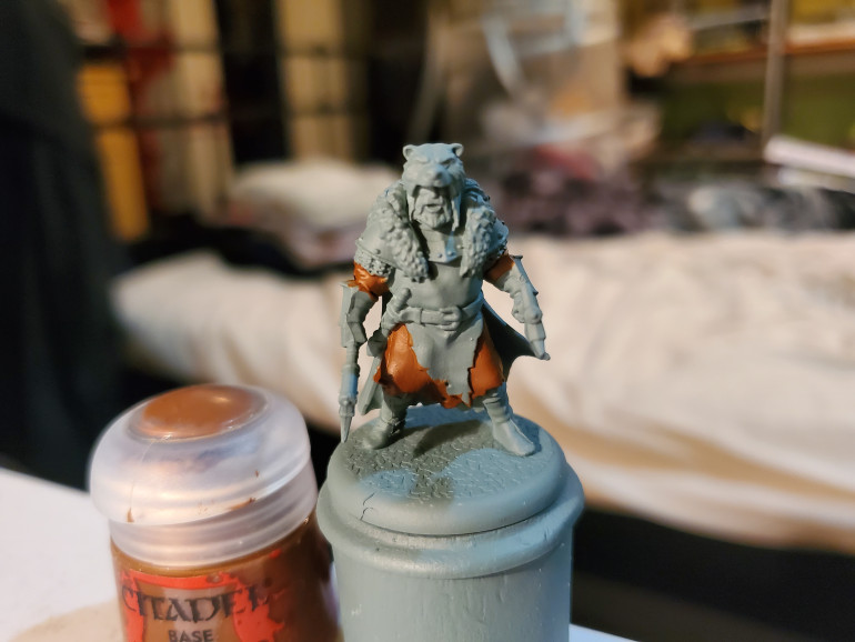 Going from my standard Mechnicus Standard Grey primer, the first thing to do is to get the cloth and leather areas done. As a lot of the layers of these minis overlaps, I found it easiest to pick 3 browns and applied them to different areas across the unit to help make everyone look 'unique'. First brown was Mournfang Brown.